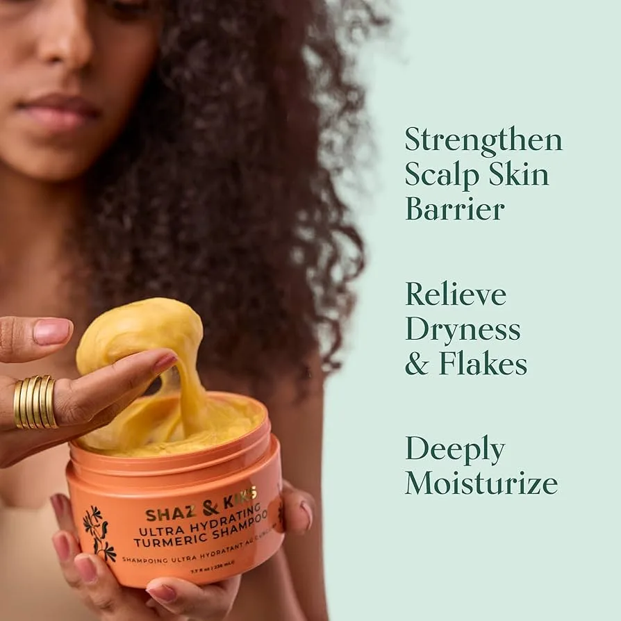 A Shaz & Kiks ultra hydrating turmeric shampoo jar held open, beside its three product claims.